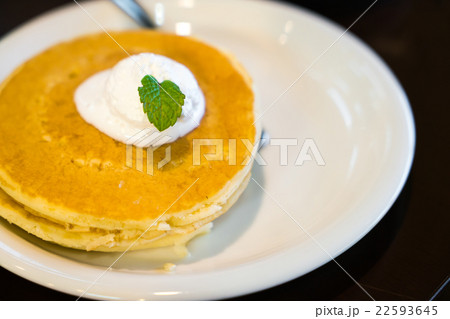 Pan cake with ice cream on table Pan cake with ice cream on table 22593645