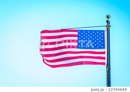 American flag on blue sky American flag on blue sky 22594699