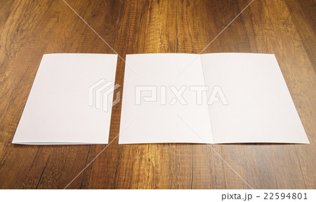 Bifold white template paper on wood texture Bifold white template paper on wood texture 22594801