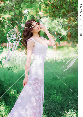 Beautiful girl with long curly hair Beautiful girl with long curly hair 22596243