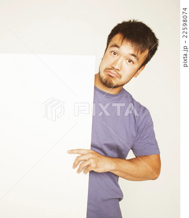 pretty cool asian man holding empty white plate 22598074