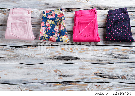 Lady's different color trousers. 22598459