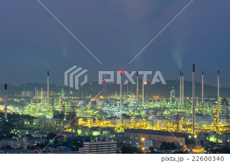 Oil refinery and storage tanks at twilight 22600340