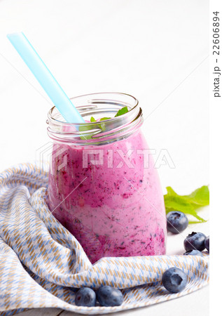 Blueberry shake on white table 22606894