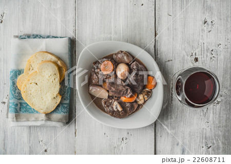 Beef bourguignon in a white ceramic dish 22608711