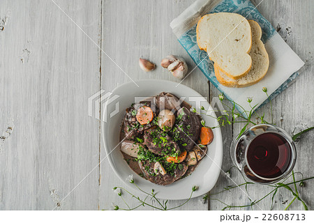 Beef bourguignon in a white ceramic plate  22608713