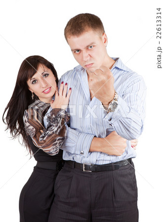 Young man protects the weak woman and and threatens his fist isolated on the white 22613314