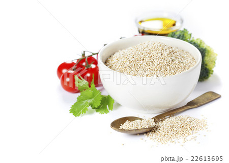 Bowl of healthy white quinoa seeds with vegetables Bowl of healthy white quinoa seeds with vegetables 22613695