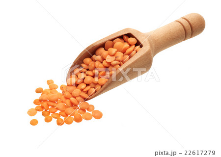 Orange lentils in a wooden scoop Orange lentils in a wooden scoop 22617279