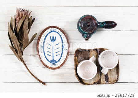 Flat lay of rustic dishes for tea Flat lay of rustic dishes for tea 22617728