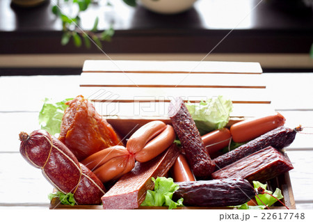 Sausage variety in wooden box close-up Sausage variety in wooden box close-up 22617748