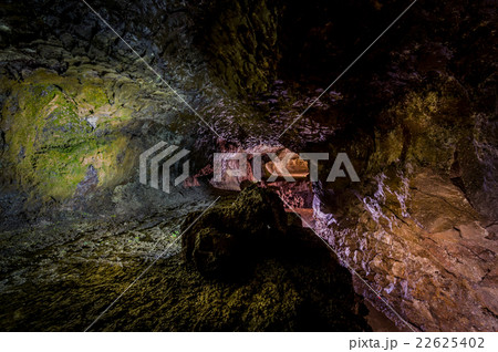 Volcanic cave under the mountains of Madeira Volcanic cave under the mountains of Madeira 22625402