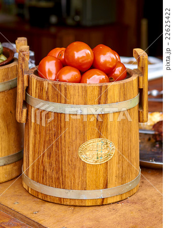 Marinated tomatoes in a barrel. Home cooking 22625422