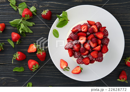 Berry cake on dark background 22628772