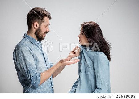 The young couple with different emotions during The young couple with different emotions during 22629098