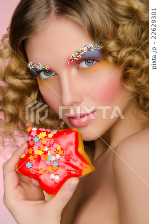 woman with donut in face woman with donut in face 22629301