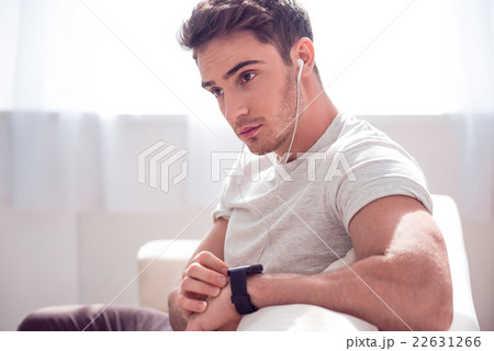 Handsome brutal man sitting on the couch 22631266