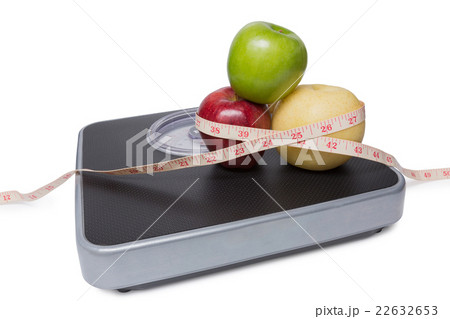 pile of fruit and tape isolated on white 22632653