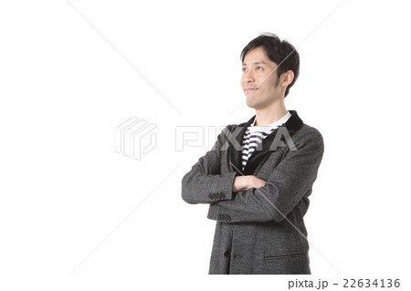 腕組みポーズの男性の写真素材