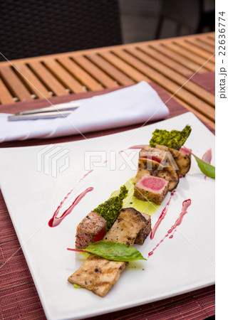 Medium rare lamb roasted decorated dish Medium rare lamb roasted decorated dish 22636774
