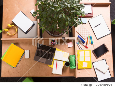 Business mess on working table in office Business mess on working table in office 22640954