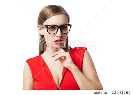 Beautiful lady in glasses thinking while looking Beautiful lady in glasses thinking while looking 22643265