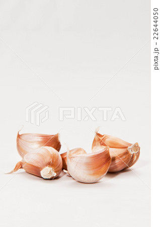 Closeup of garlic on white background Closeup of garlic on white background 22644050