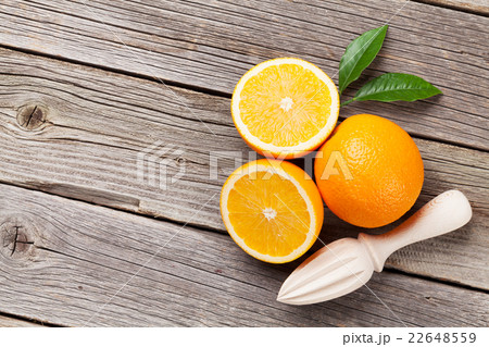 Fresh ripe oranges and juicer 22648559