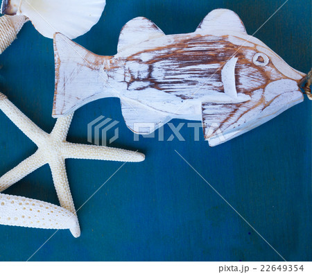 woden fish and starfishes on blue woden fish and starfishes on blue 22649354