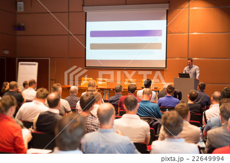 Business speaker giving a talk in conference hall. 22649994