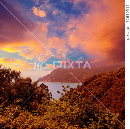 Rocky sea coast at sunset with dramatic sky Rocky sea coast at sunset with dramatic sky 22659515