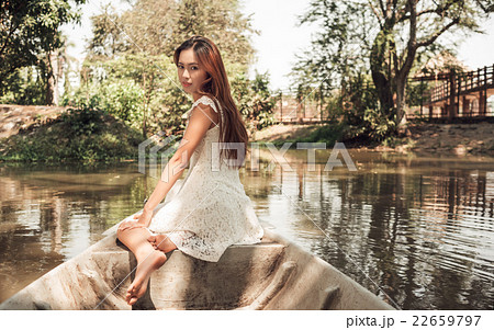 Woman in boat Woman in boat 22659797