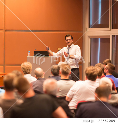 Business speaker giving a talk in conference hall. 22662089