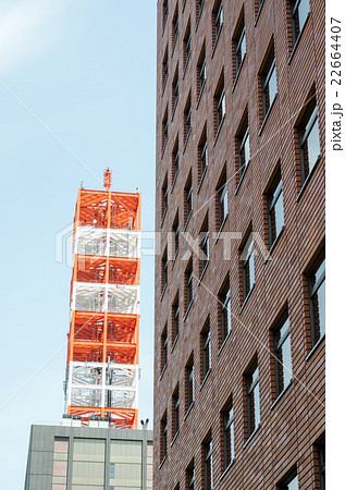 Orange steel frame near the old building. Orange steel frame near the old building. 22664407