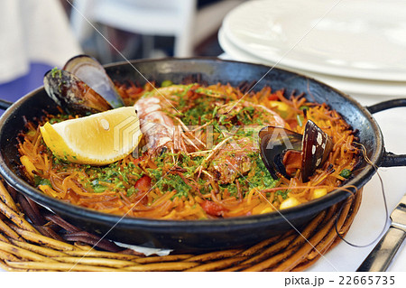 spanish fideua, a typical noodles casserole 22665735