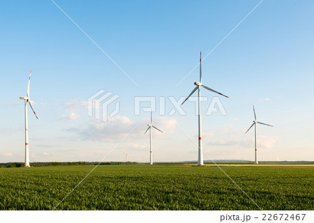 Wind turbines in front of a coal-fired plant Wind turbines in front of a coal-fired plant 22672467