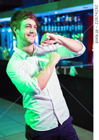 Happy man dancing in front of bar counter Happy man dancing in front of bar counter 22674292