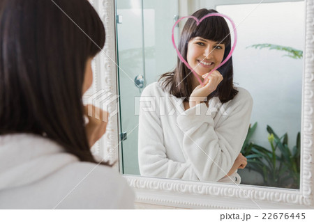 Beautiful young woman reflection in mirror Beautiful young woman reflection in mirror 22676445