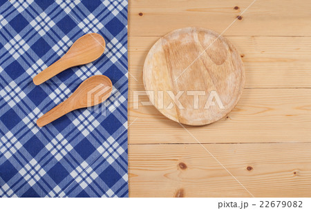 Tablecloth, wooden spoon, on wood textured  22679082