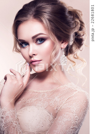 Beautiful bride with fashion wedding hairstyle - 22681801