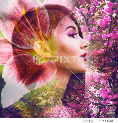 Beautiful woman with a flowers in the nature. Beautiful woman with a flowers in the nature. 22688001