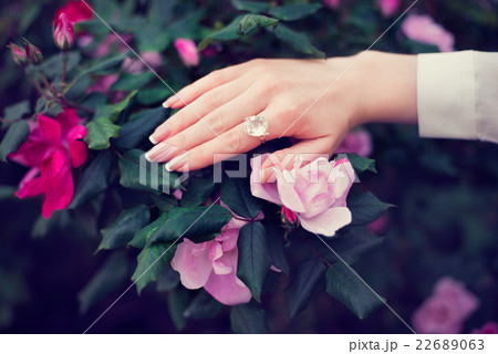 Woman hand with french french manicure and ring 22689063