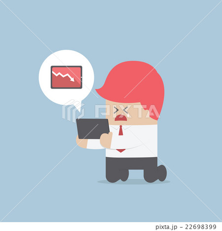 Businessman holding a tablet with falling graph 22698399