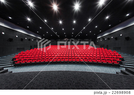 Empty rows of red theater or movie seats. Chairs 22698908