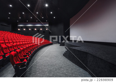 Empty rows of red theater or movie seats. Chairs 22698909