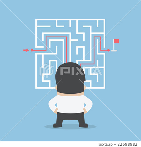 Businessman standing in front of a maze 22698982