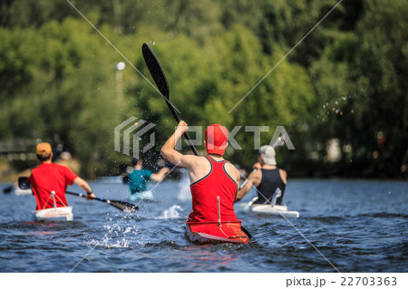 group of athletes canoeists boating on lake group of athletes canoeists boating on lake 22703363