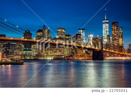 Manhattan with skyscrapers and  Brooklyn Bridge 22705031
