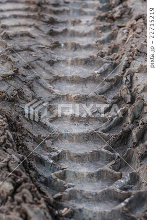 Close-up tire tracks truck on a dirt road in Close-up tire tracks truck on a dirt road in 22715219