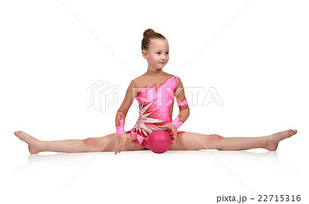 gymnast sitting on split with ball 22715316